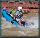 Canoeman running Joe Hutch Rapid in Desolation Canyon of the Green River, Utah
