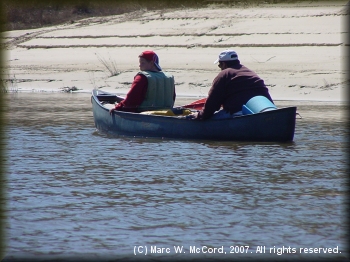 Austin and Paul fishing their way downriver