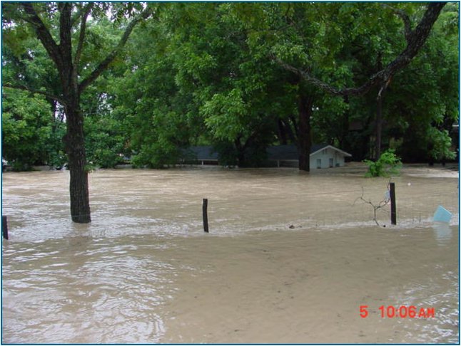 By July 5, 2002, the river was in full flood stage across 4th Crossing on River Road