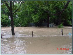 Flood waters at 4th Crossing into the houses