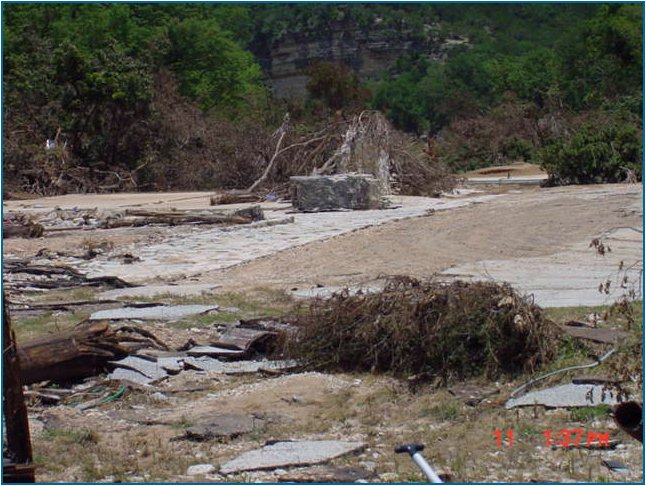The foundation and part of the fireplace are all that is left of Whitewater Sports, and early victim of the flood of 2002