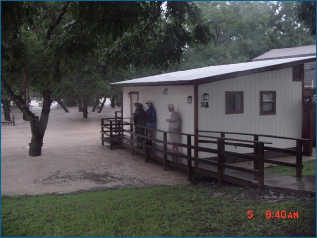 Water is under the cabins at River Valley Resort on July 5, at 8:40 AM