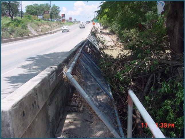Floodwaters buried the FM 306 bridge beside Whitewater Sports