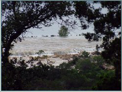Flood waters coming across the spillway