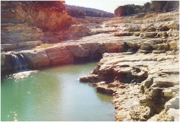 New pool created by flood erosion on the spillway